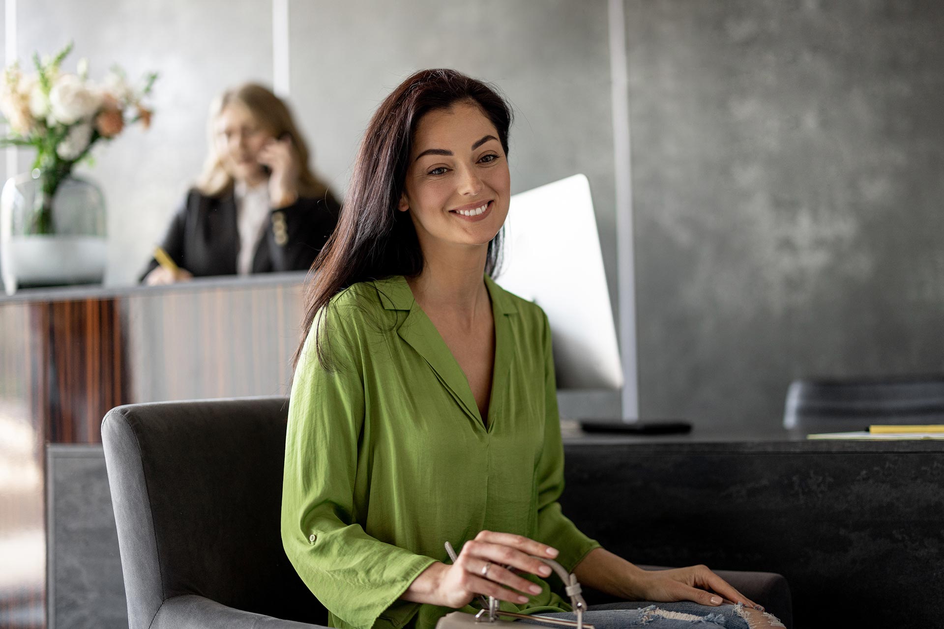 woman at reception desk of a modern clinic 2023 11 27 05 16 26 utc.jpg
